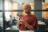 Woman in an office looking at her phone