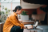 Woman sitting at a table using her laptop