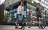 couple using bike and scooter