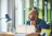 Man sitting at his latop in an office