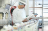 Technician checking milk on production line