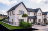 White semi detatched new build with grey roof