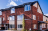 Red brick end of terrace 3 storey new build house