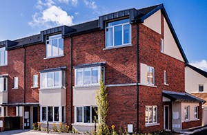 Red brick end of terrace 3 storey new build house