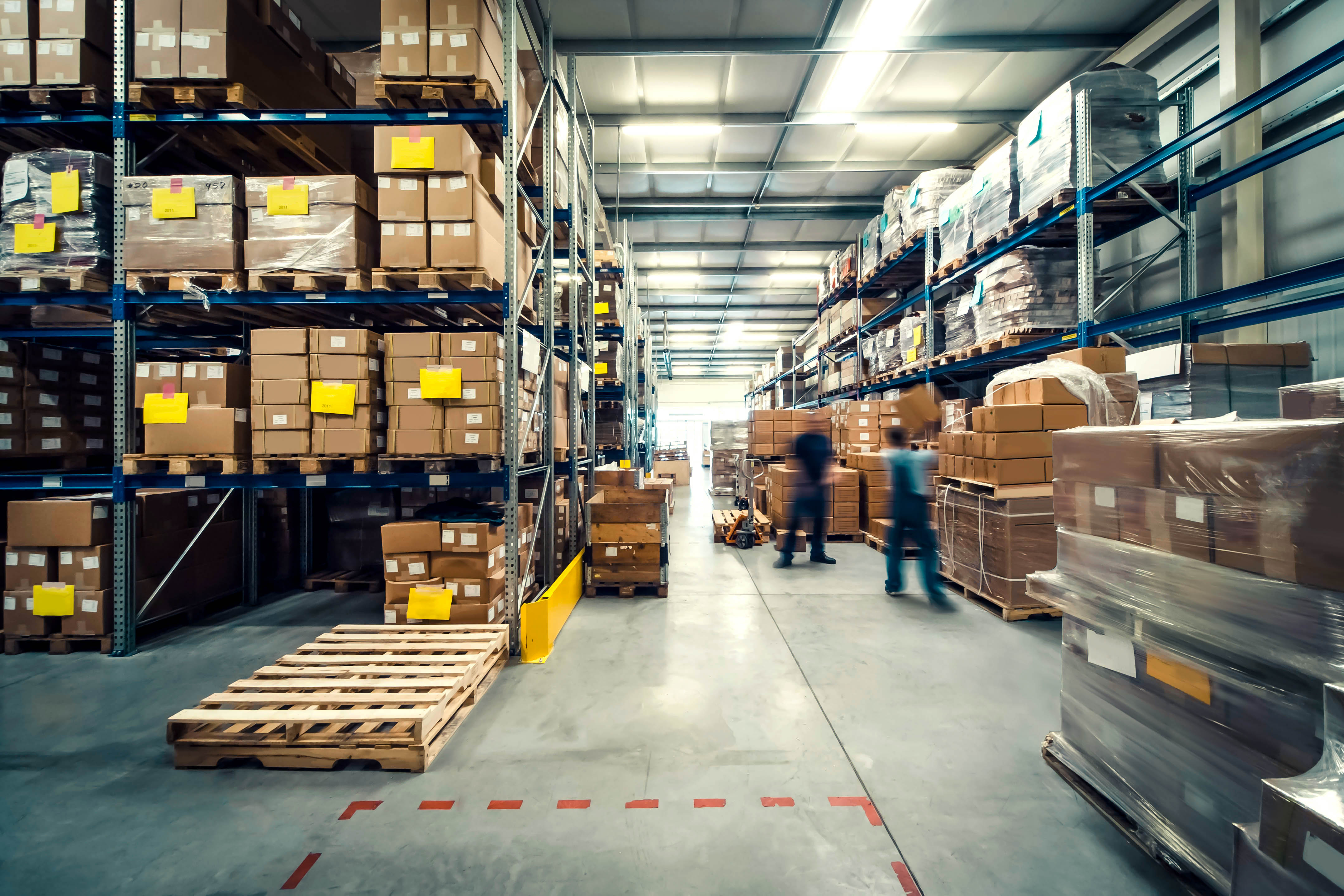 View inside a warehouse with staff in operation
